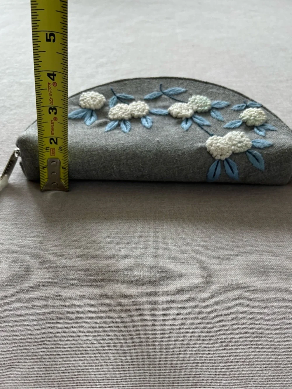 Grey embroidered floral half moon whimsical coquette clutch bag.